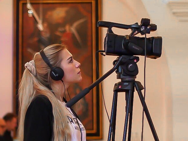 Woman filming live event