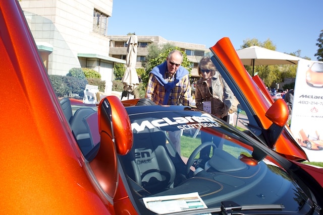 Potential clients inspect the new McLaren 12C