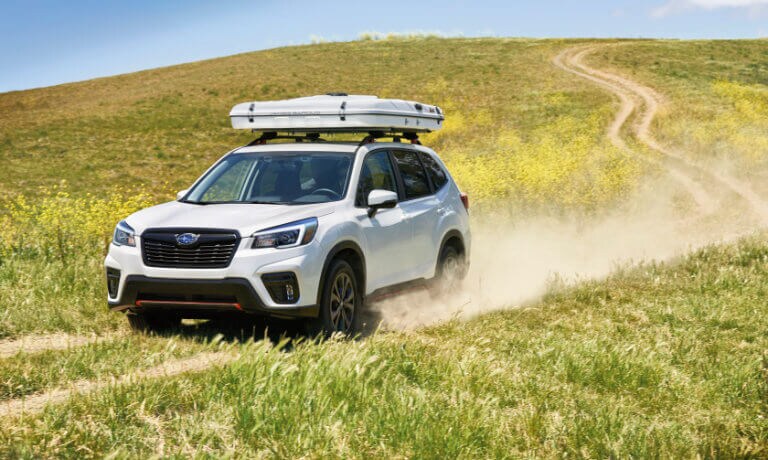2021 Subaru Forester exterior offroad in green field
