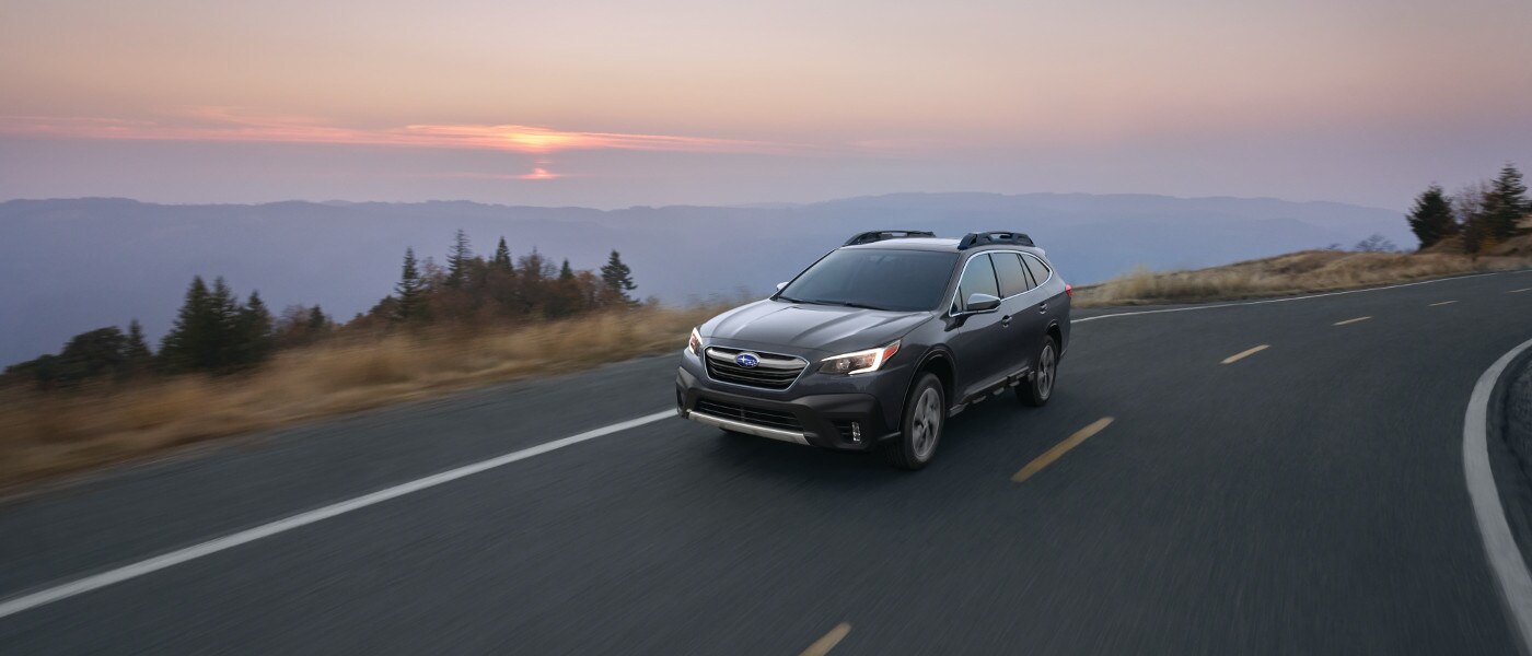 Green 2020 Subaru Outback on road