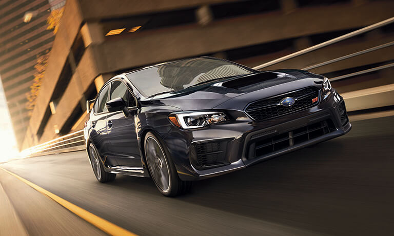 2021 Subaru WRX exiting a highway ramp
