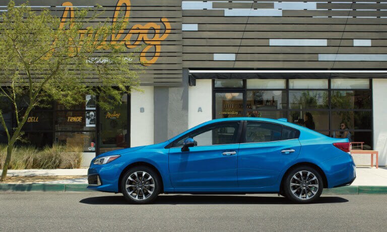 2021 Subaru Impreza parked outside a store