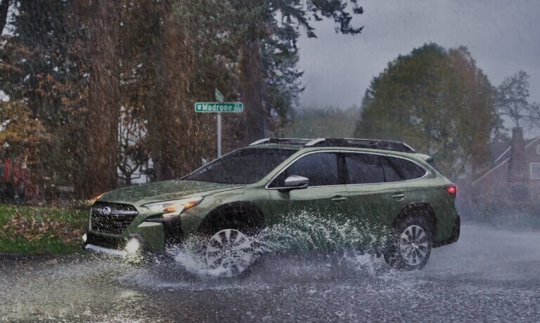 2023 Subaru Outback Exterior Driving Through Giant Puddle