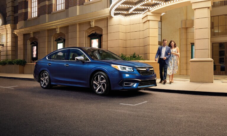 2022 Subaru Legacy With Couple Outside Theater