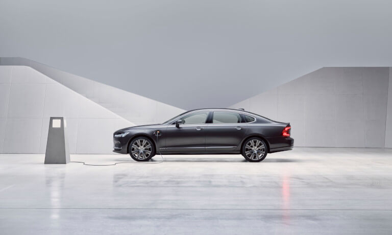 Volvo S90 Recharge plugged into charging station