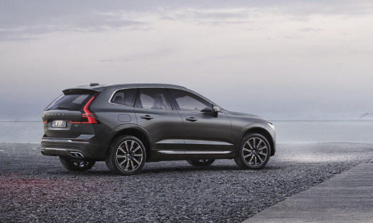 2021 Volvo XC60 parked on some gravel at a beach