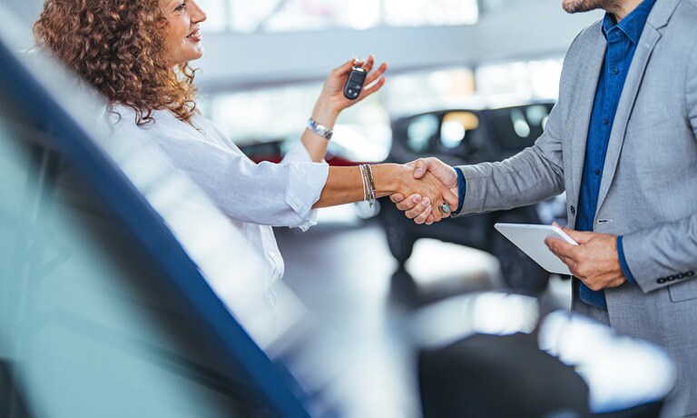 McLaughlin Volvo Special Offers A businessman purchasing a car