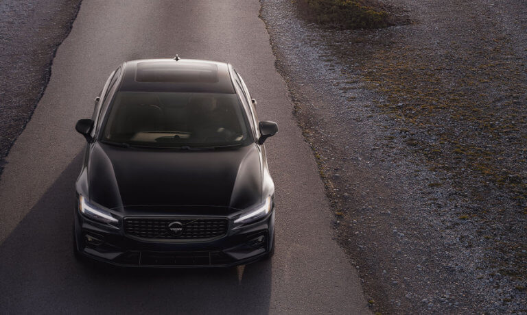 2025 Volvo S60 Exterior Driving On Road At Sunset