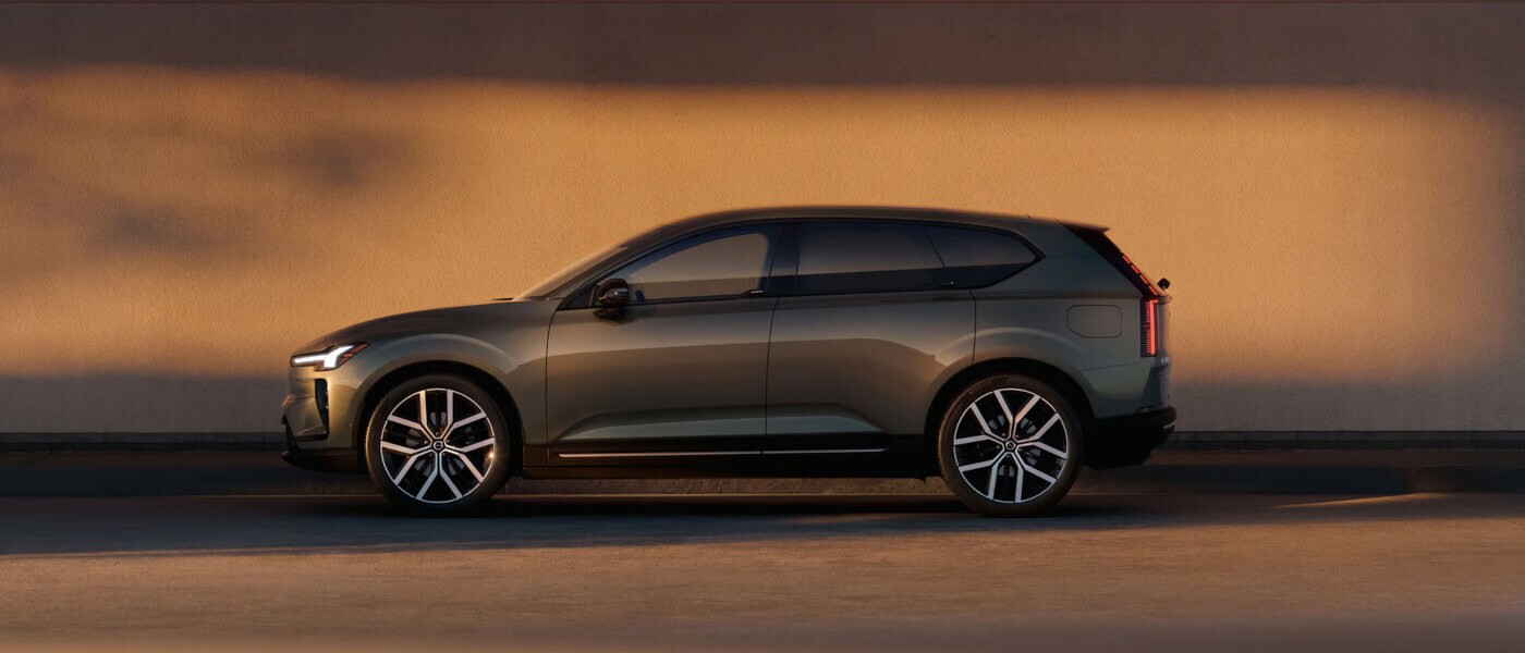 2027 Volvo EX60 Exterior Side View By Wall