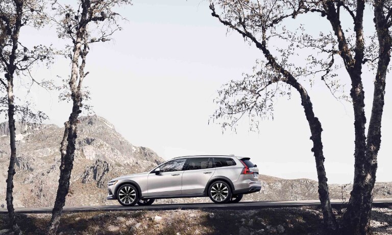 2020 volvo XC60 in white driving throughout the mountians.jpg