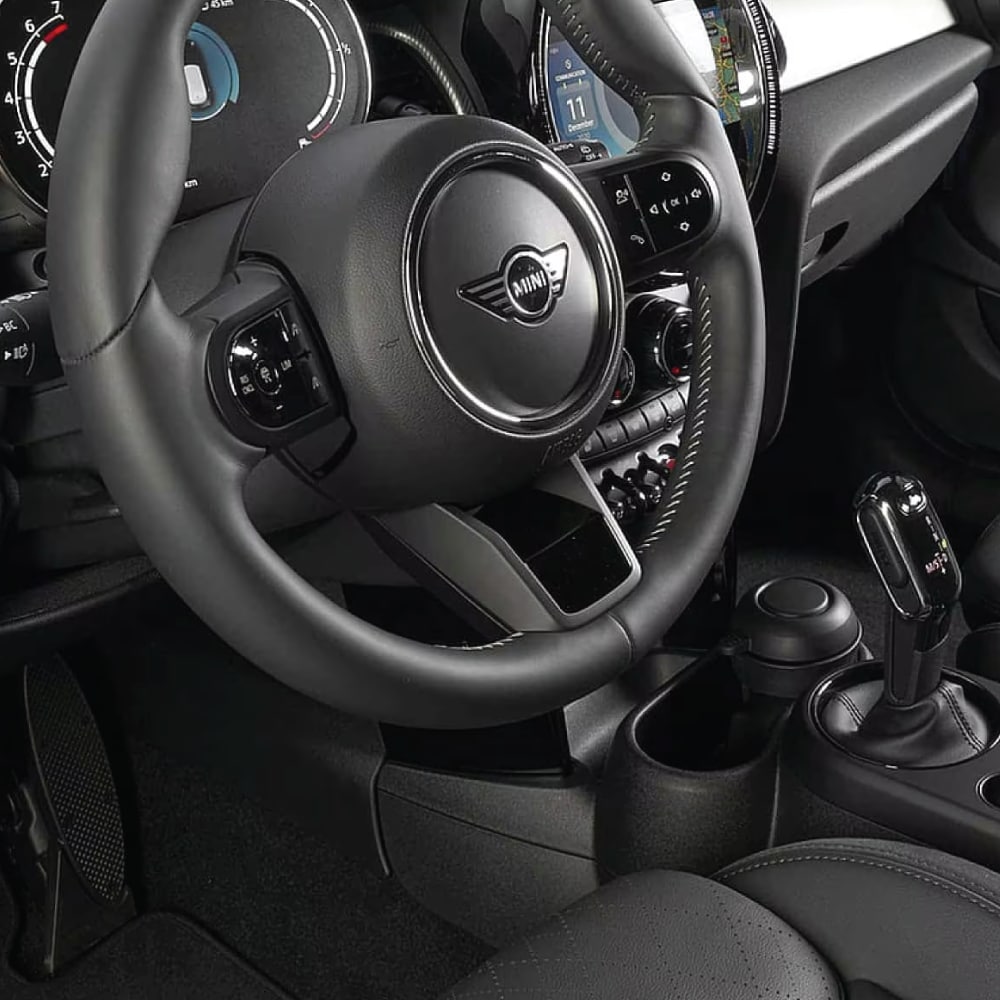 Image-8.png Interior shot of a MINI steering wheel with black leather