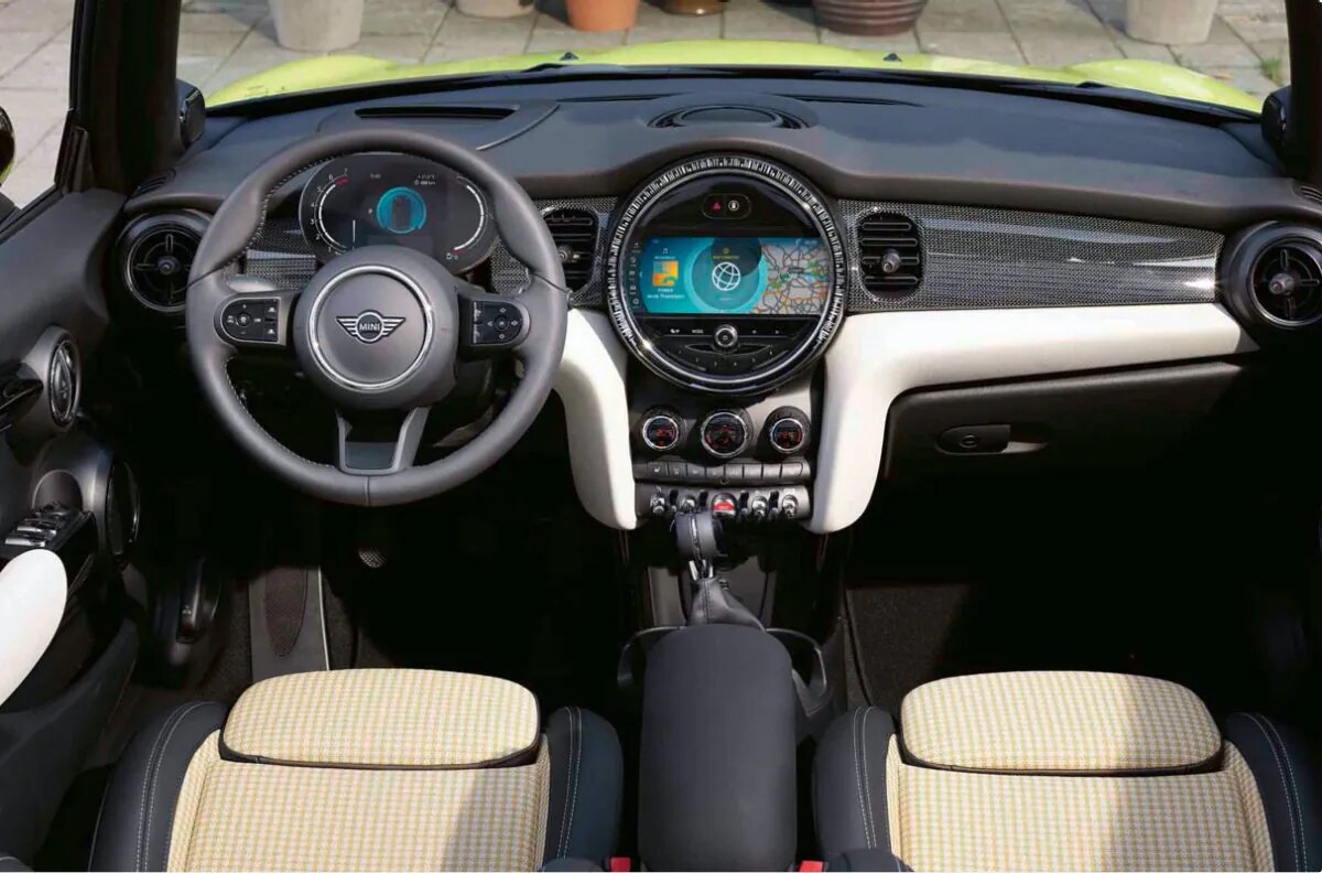 A view of the updated steering wheel, dashboard, and radio of the MINI Convertible.