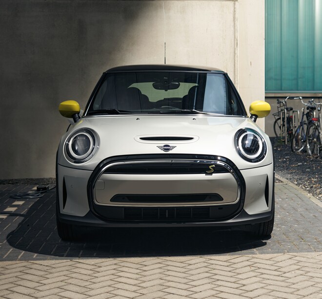 8.Alt Text A 2022 MINI Cooper Electric 2 Door parked.png
