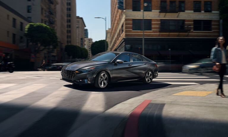 2023 Hyundai Elantra exterior turning in city intersection