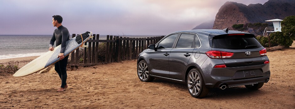2018 Hyundai Elantra GT on the beach with surfer