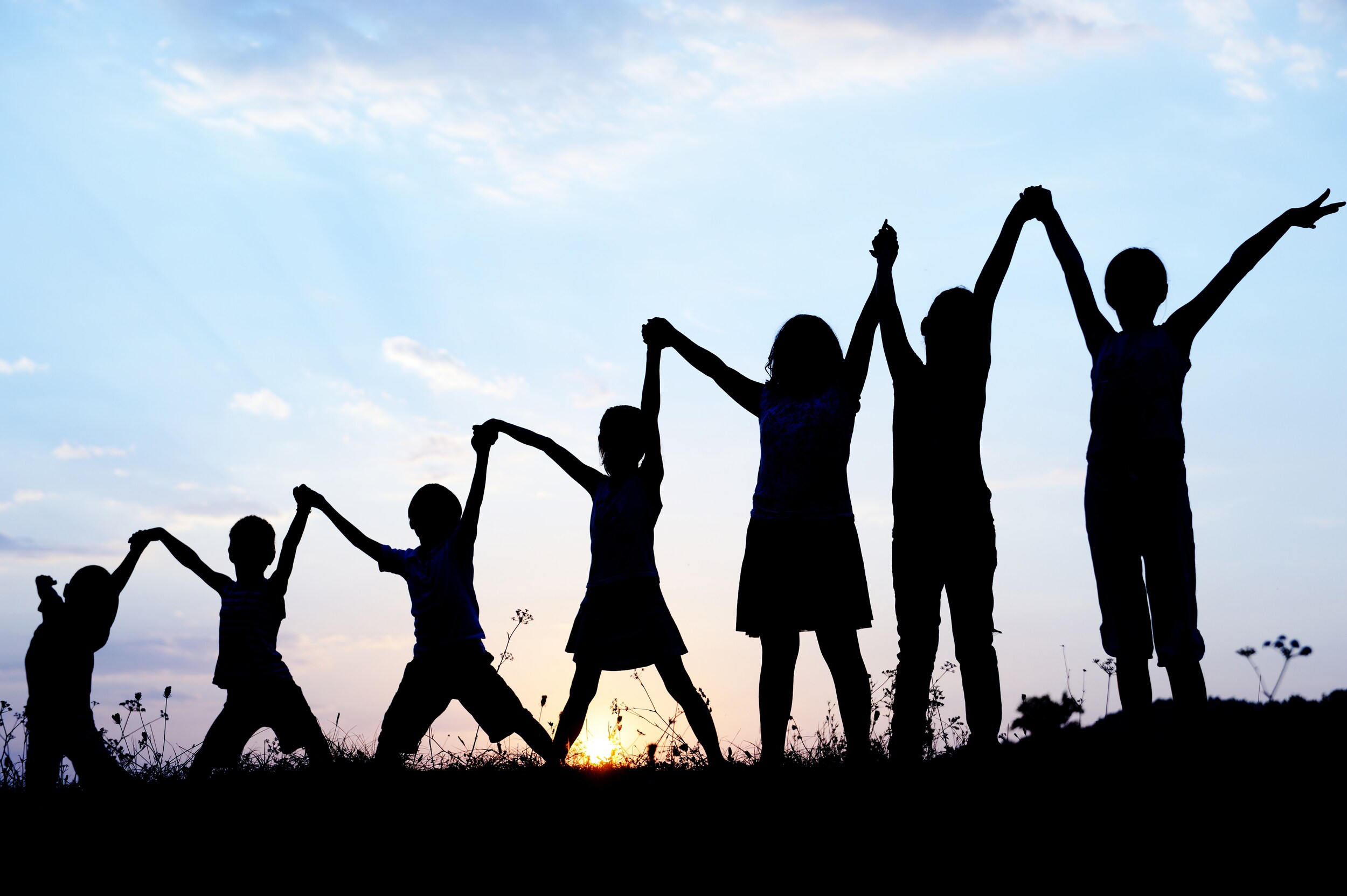 happy-children-playing-on-hot-summertime-SBI-300989103.jpg