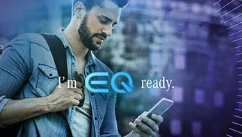 Charging on the Go. Person holding device controlling EQ charging