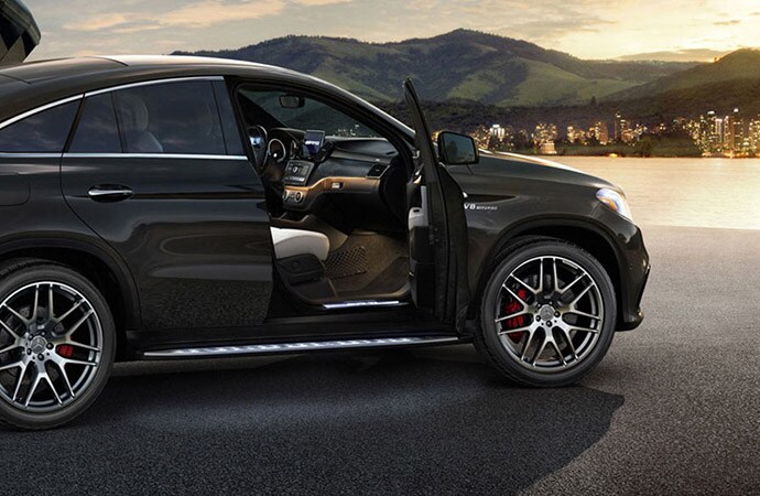 Black Mercedes GLE SUV with passenger door open