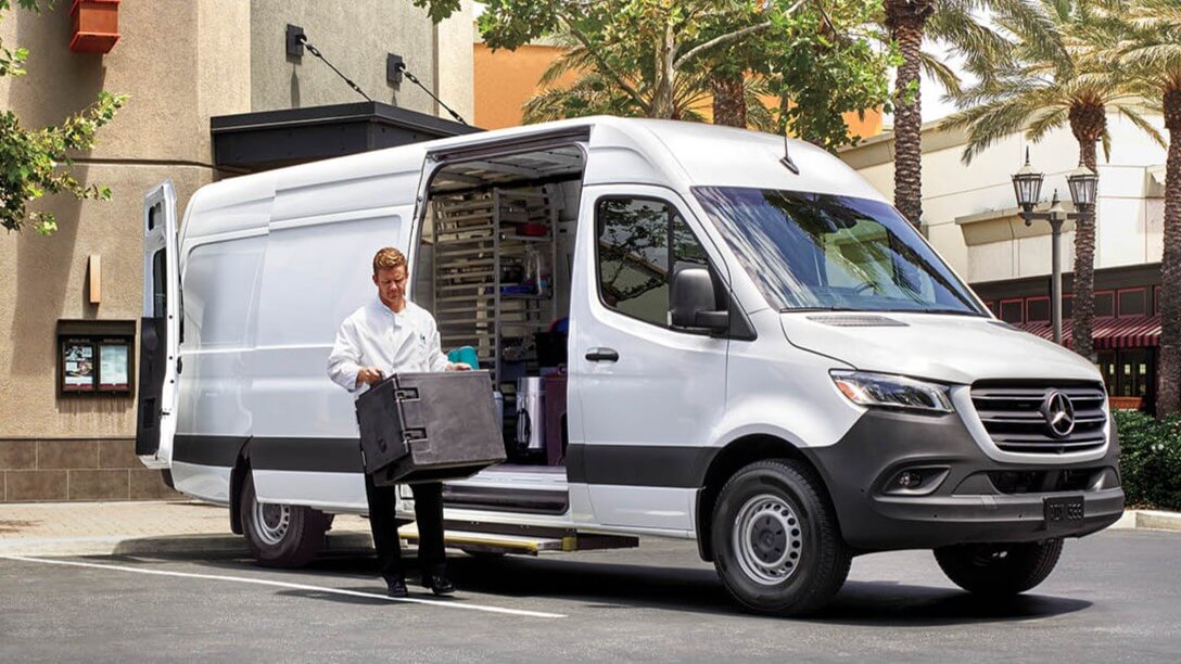 Learn about the specs, configurations, and color options of the Mercedes-Benz Sprinter Cargo Van Mercedes-Benz Sprinter Cargo Van being unloaded at a business