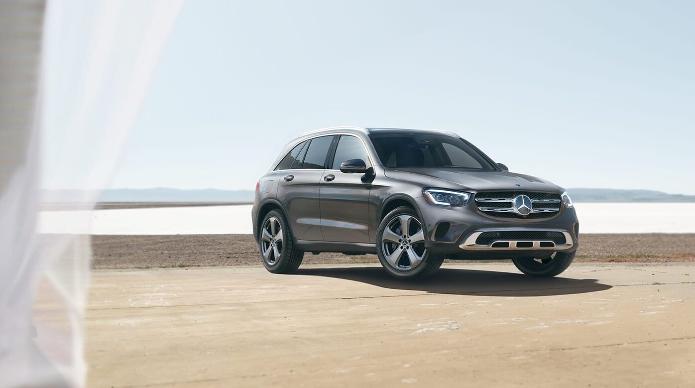 2022-Mercedes-Benz-GLC-3.PNG A gray 2022 Mercedes-Benz GLC sits parked at an angle on a beach