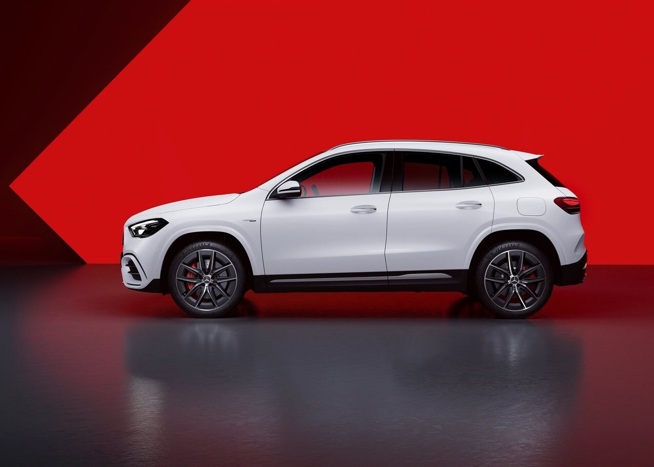 Mercedes-Benz-GLA35_AMG-2024-1280-04.jpg A Mercedes-Benz GLA parked in a red room.