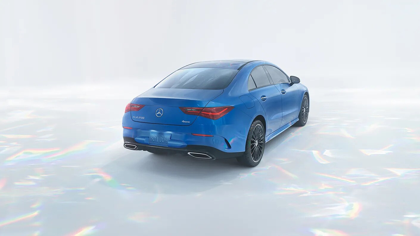 2025-CLA-COUPE-GAL-009-F-TE-FE-DR.jpg A blue Mercedes-Benz CLA on display.