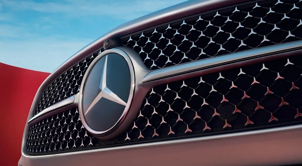 Mercedes-Benz%20C-Class%20for%20Sale%20-%202025%20Mercedes-Benz%20C%20300%20-%20Grille%202.jpg A close-up shows the grille and badge on a popular Mercedes-Benz C-Class for sale, a silver 2025 Mer…