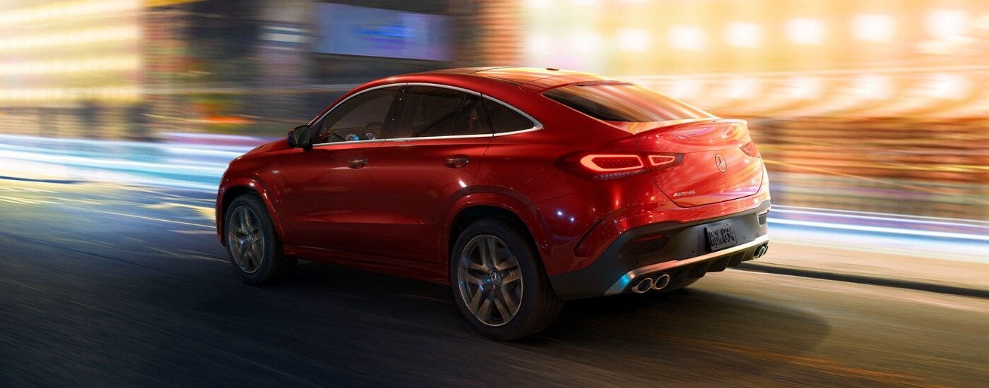 Used%20Mercedes-Benz%20for%20Sale%20Near%20Harrisburg%20-%202021%20Mercedes-Benz%20AMG%20GLE%20-%20Lights.jpg A red 2021 Mercedes-Benz AMG GLE is shown from the side driving on a city street.