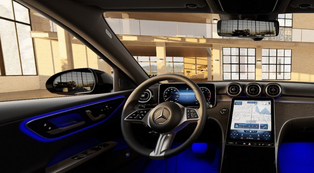 The black interior and dash in a 2024 Mercedes-Benz C 300 Sedan is shown.
