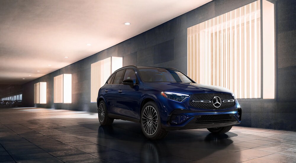 Mercedes-Benz%20GLC%20for%20Sale%20-%202025%20Mercedes-Benz%20GLC%20300%204MATIC%20Pinnacle%20-%20Garage.jpg A blue 2025 Mercedes-Benz GLC 300 4MATIC Pinnacle parked in a garage.