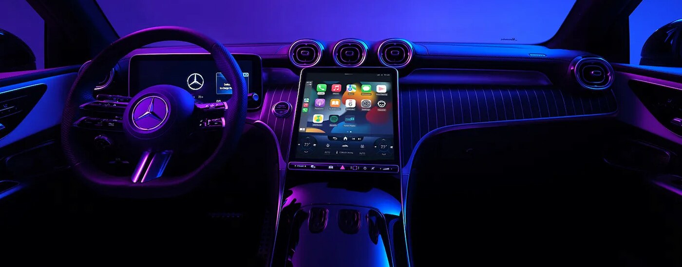 Blue and purple ambient lighting in the cabin of a 2025 Mercedes-Benz GLC for sale.