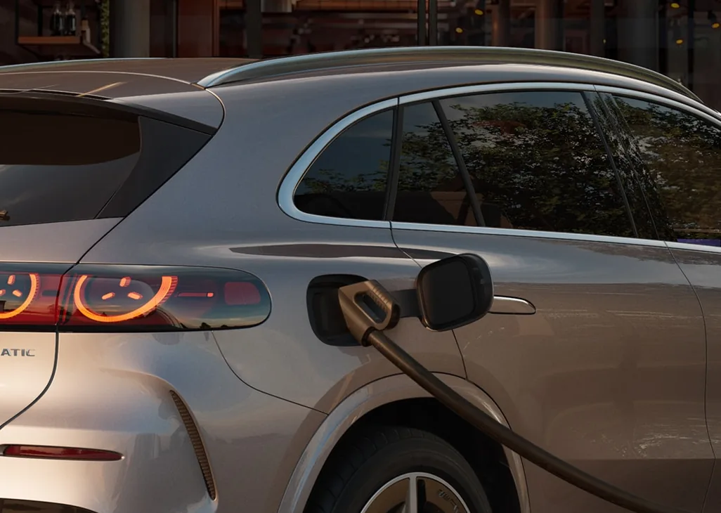Silver GLC Electric SUV connected to a DC fast charger