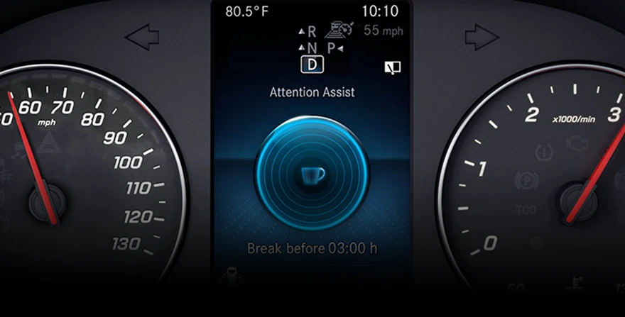 Sprinter instrument cluster showing the Attention Assist coffee-cup icon and a "Break before 03:00 h" prompt