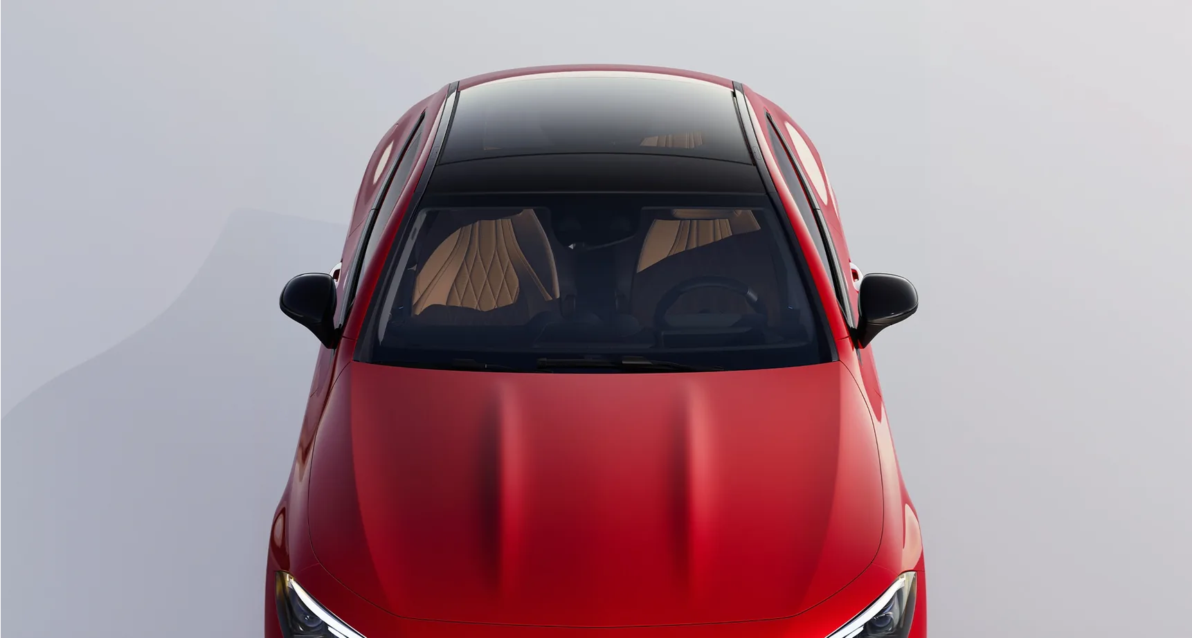 Overhead view of a red CLE Coupe showing its tinted glass Panorama roof