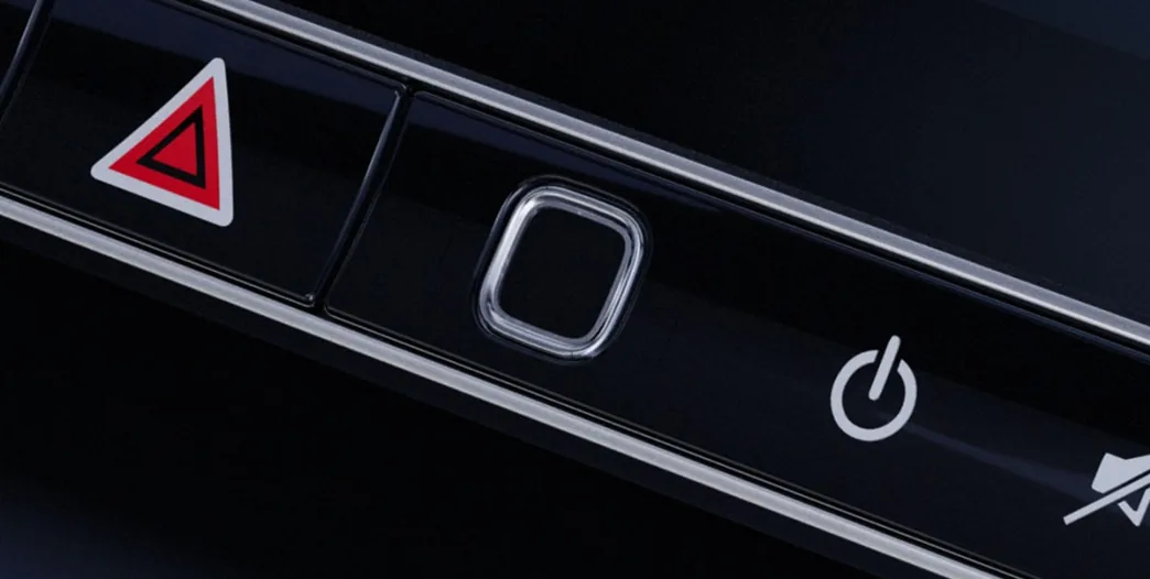 CLE console buttons with the hazard switch and fingerprint scanner