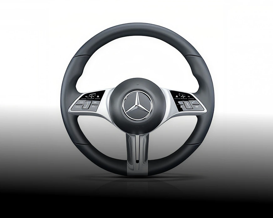 E-Class leather steering wheel with silver-trimmed spokes