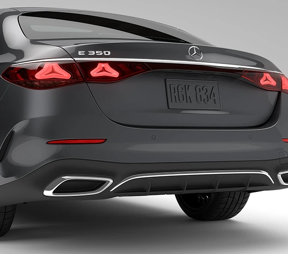 Rear view of a dark E 350 Sedan showing its three-pointed-star taillamps