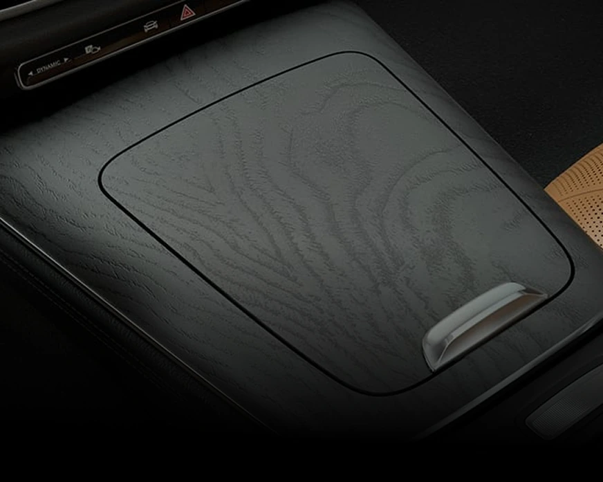 Close-up of the Natural Grain Black Ash wood trim on the E-Class console