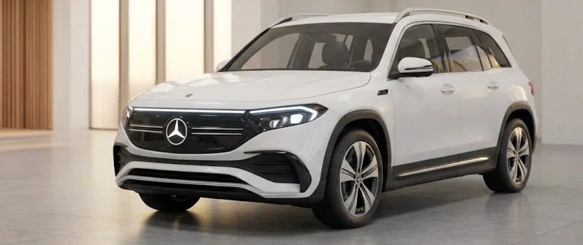 White Mercedes-Benz electric SUV in a showroom