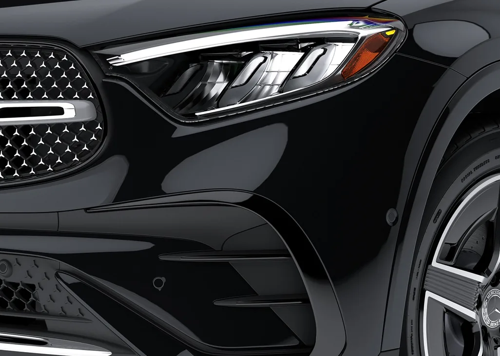 Close-up of the LED headlamp on a black GLC Coupe