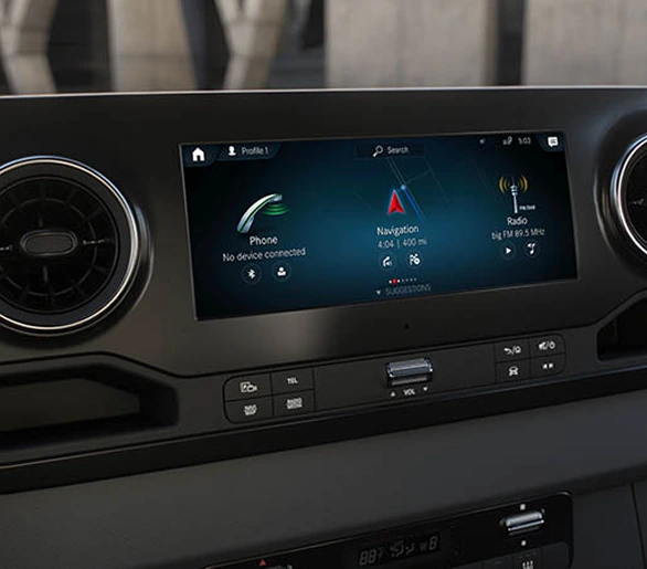 MBUX centre display showing the phone, navigation and radio home screen
