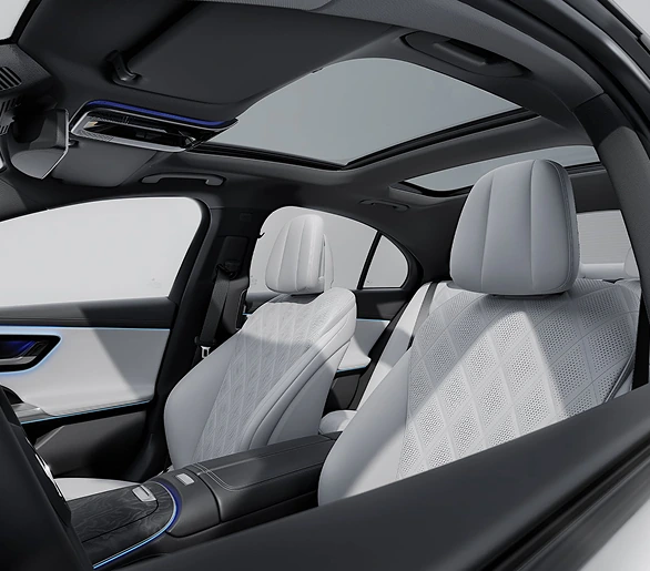 E-Class cabin with light grey seats under the panorama roof