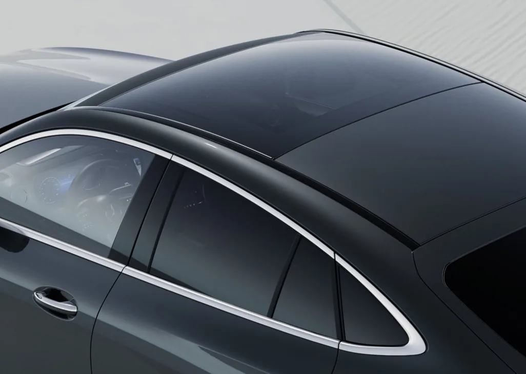 Sloping roofline and Panorama roof of a black GLC Coupe