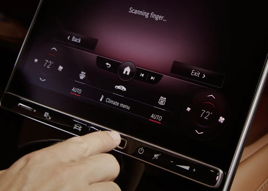 Finger on the GLC in-dash fingerprint reader below the touchscreen