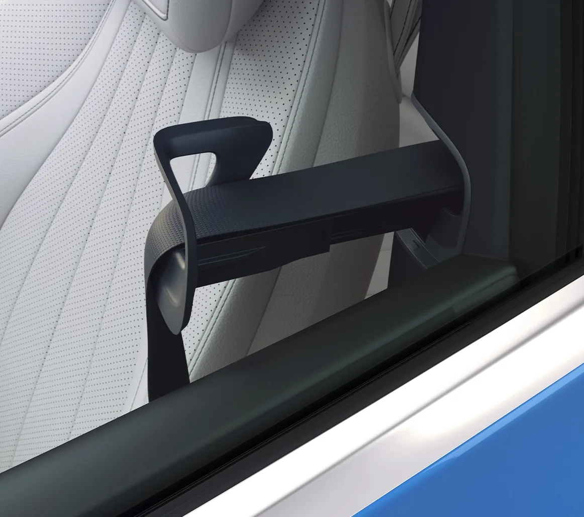 CLE automatic seat belt presenter beside a white seat