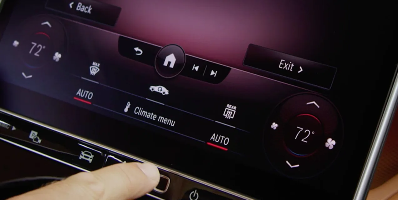 Finger on the GLC Coupe fingerprint reader below the climate controls