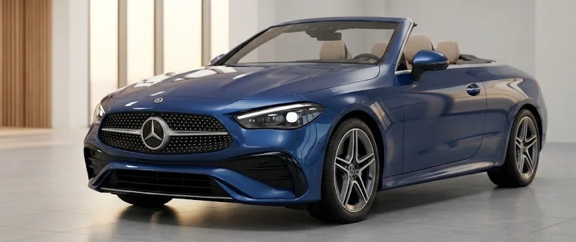 Blue Mercedes-Benz convertible with the roof down in a showroom