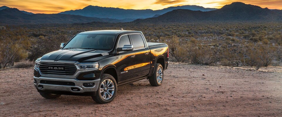 2019 Ram 1500 near a mountainous sunset