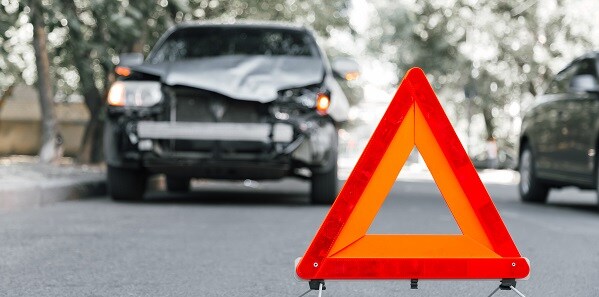 Car%20Accident.jpg SUV sitting on side of road after being involved in an accident.