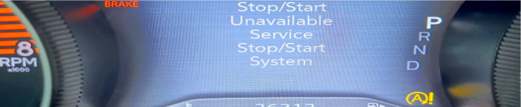 start-stop-warning-light.jpg Dashboard with a start-stop system error warning illuminated.